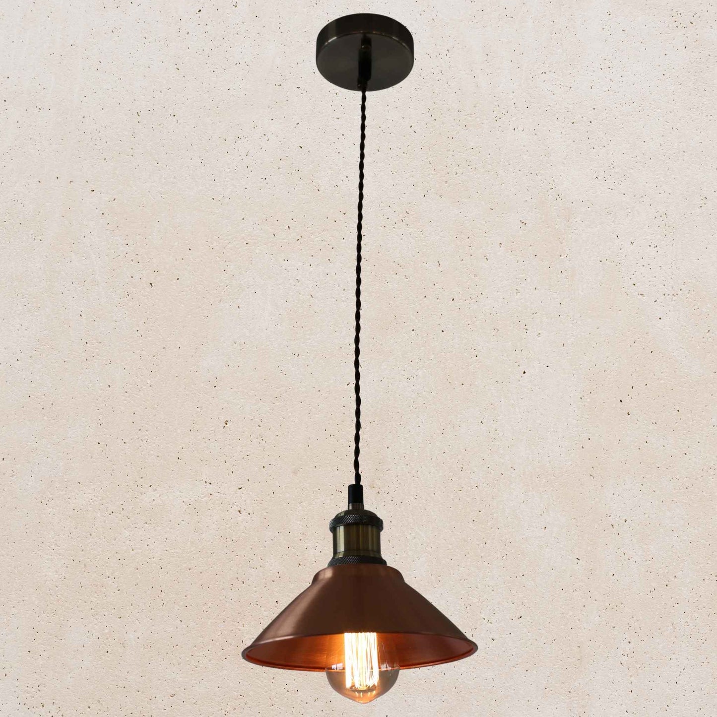 Vintage-style copper pendant light with a beige background