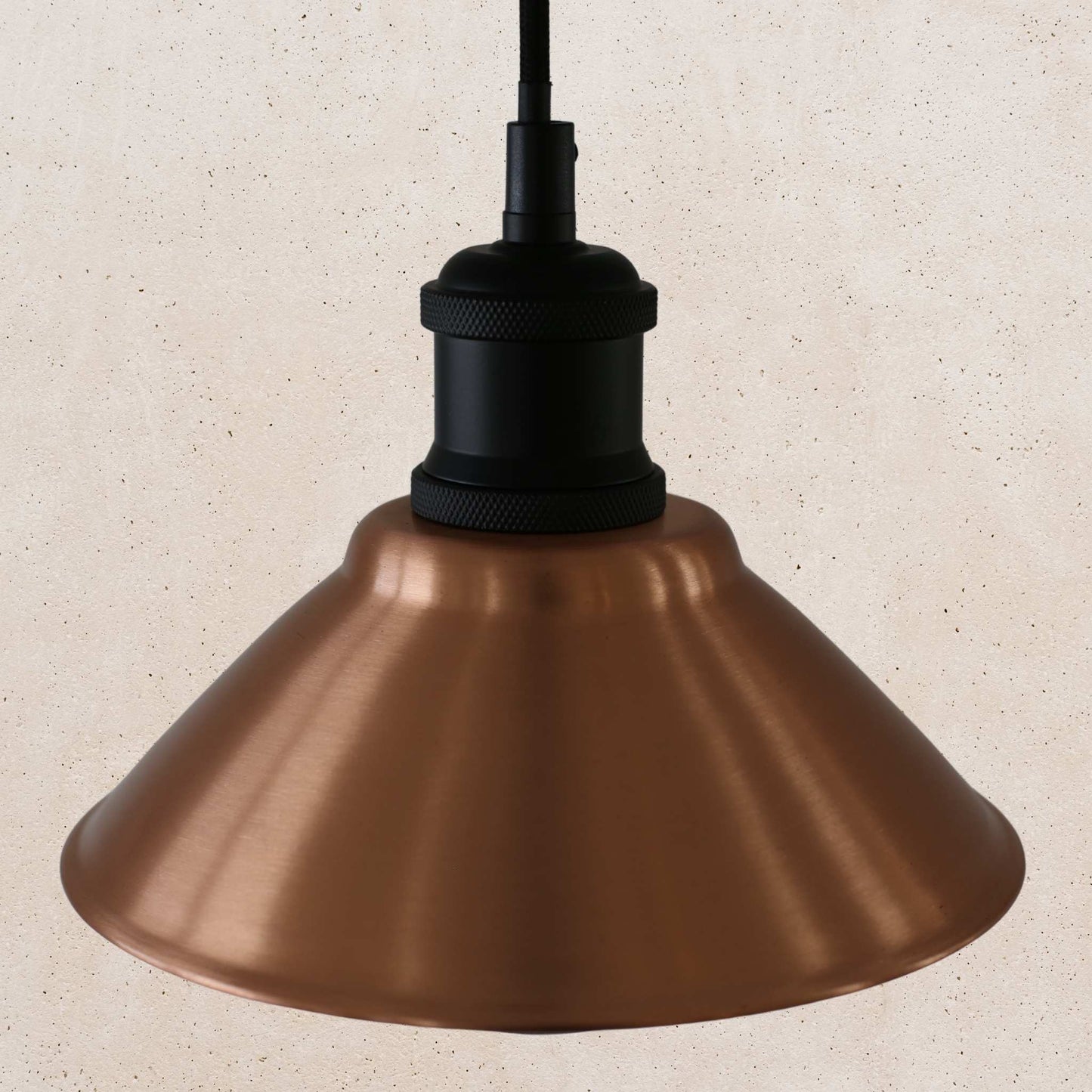 Vintage-style copper pendant light with a beige background