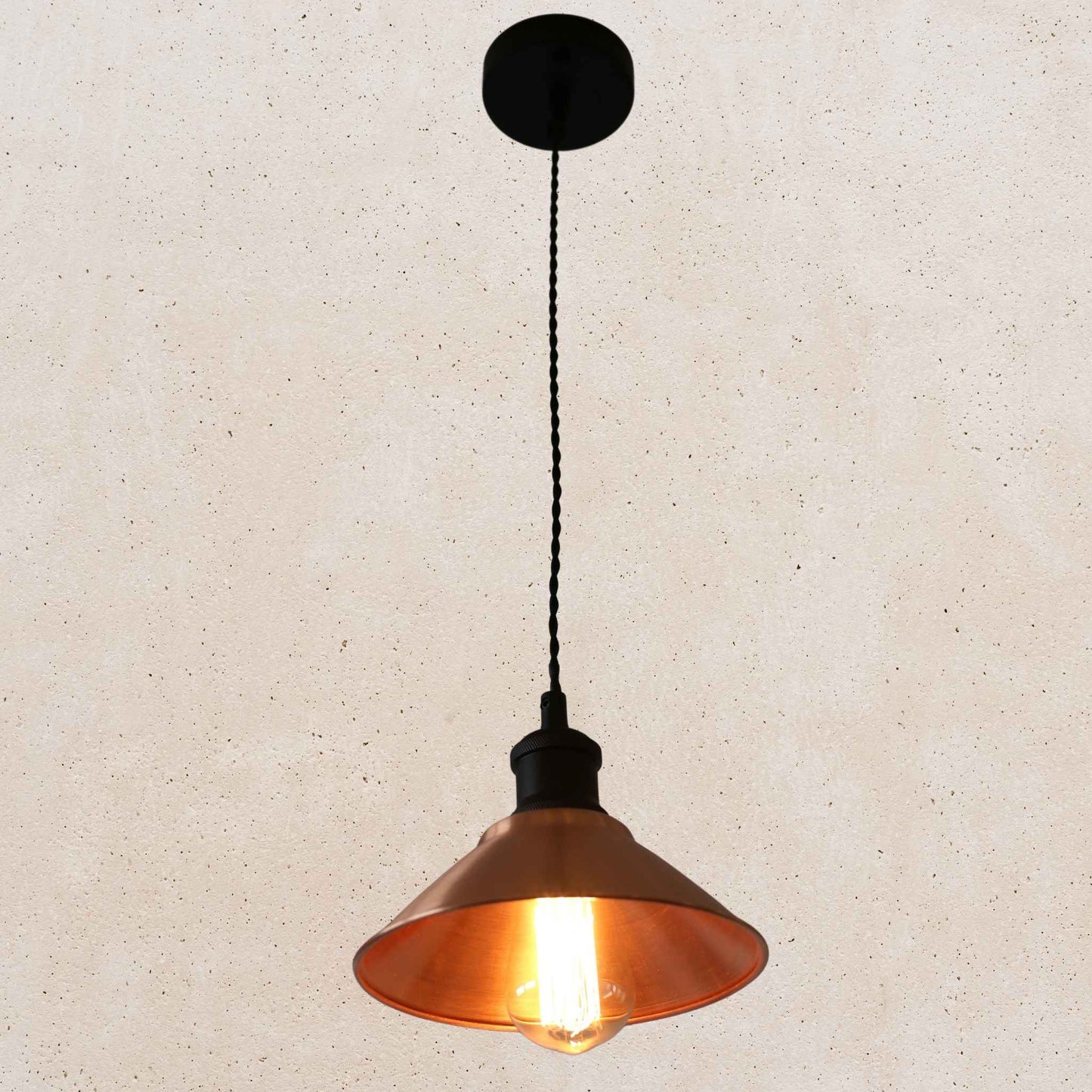 Vintage-style copper pendant light with a beige background