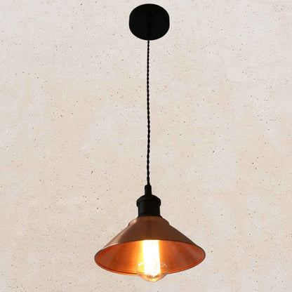 Vintage-style copper pendant light with a beige background