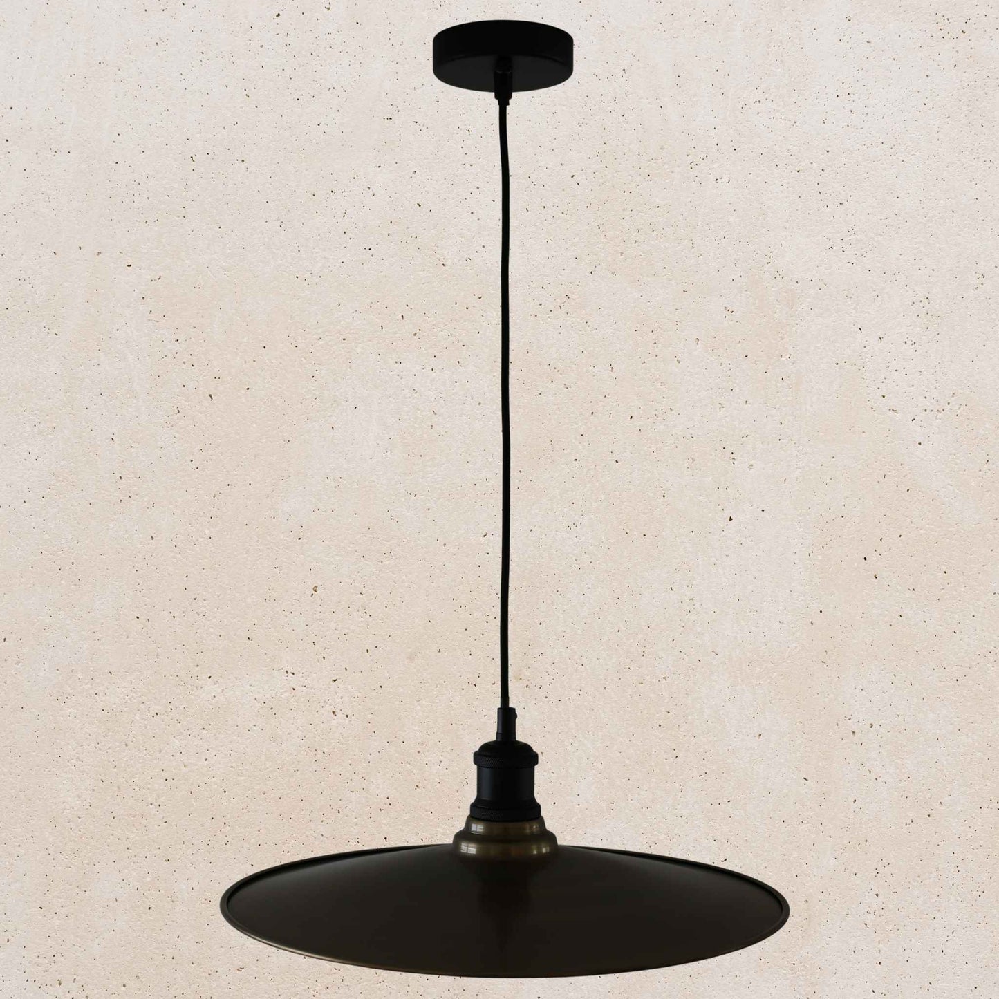 Antique brass pendant light fixture on a beige background